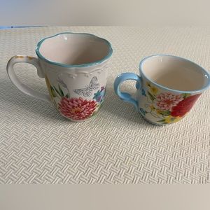 Two pioneer women mugs never used 12 and 16 ounces